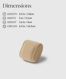 This TAWBURY Bayswater Watch Box Pillow in beige, crafted from velveteen fabric, measures 2.3 in x 2 in x 1.6 in with a 6.5 in circumference, adding a sophisticated touch to any setting.