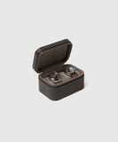 Two Fraser 2 Watch Travel Case - Brown from TAWBURY are safely stored on a white surface.