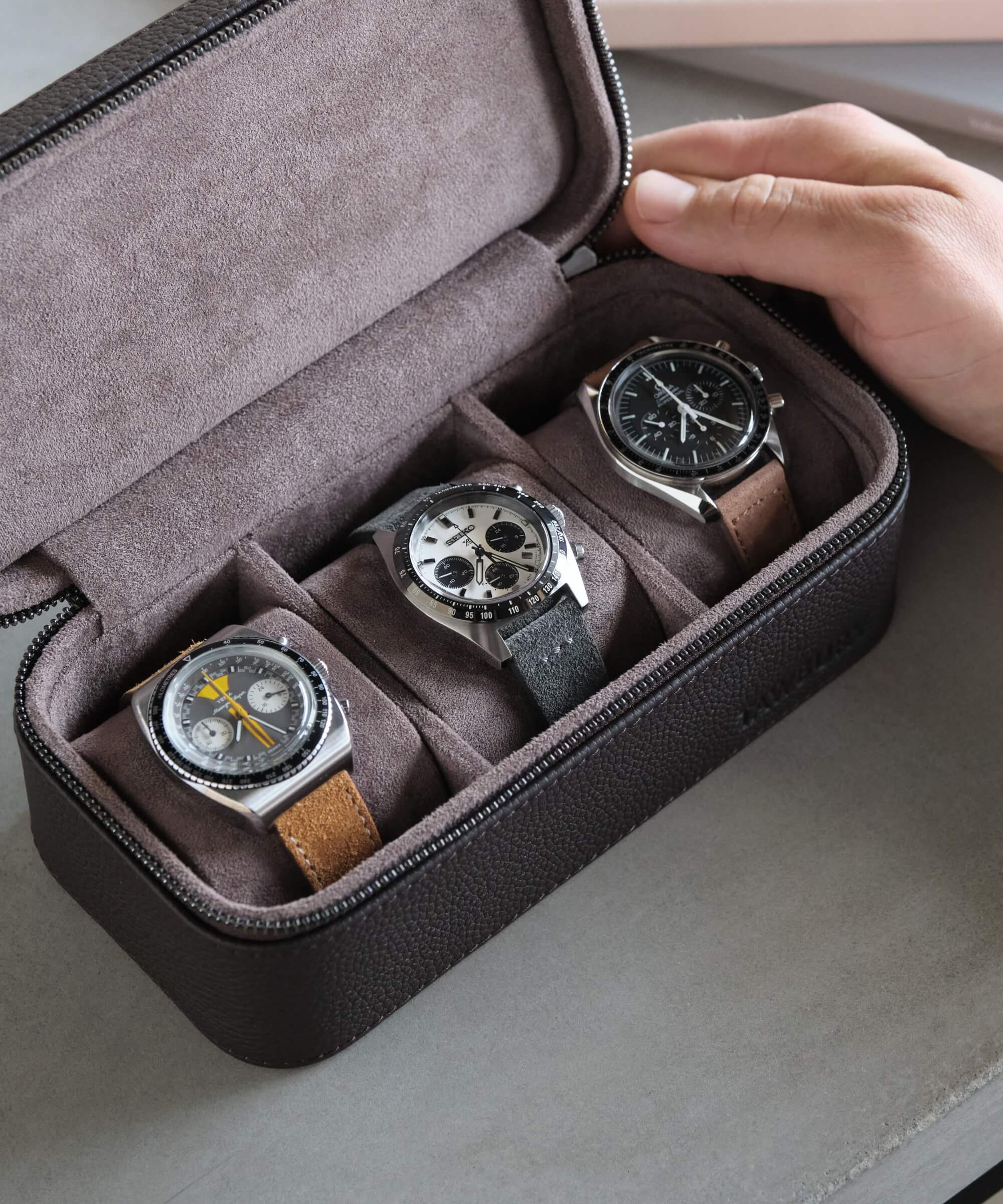 Three Fraser 3 Watch Travel Cases - Brown by TAWBURY in a compact leather case that offers protection for easy travel.