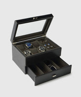 The TAWBURY Bayswater 6 Watch Jewellery Box in black/charcoal features a glass lid and pull-out drawer—ideal for organizing six watches, cufflinks, rings, and sunglasses in style.