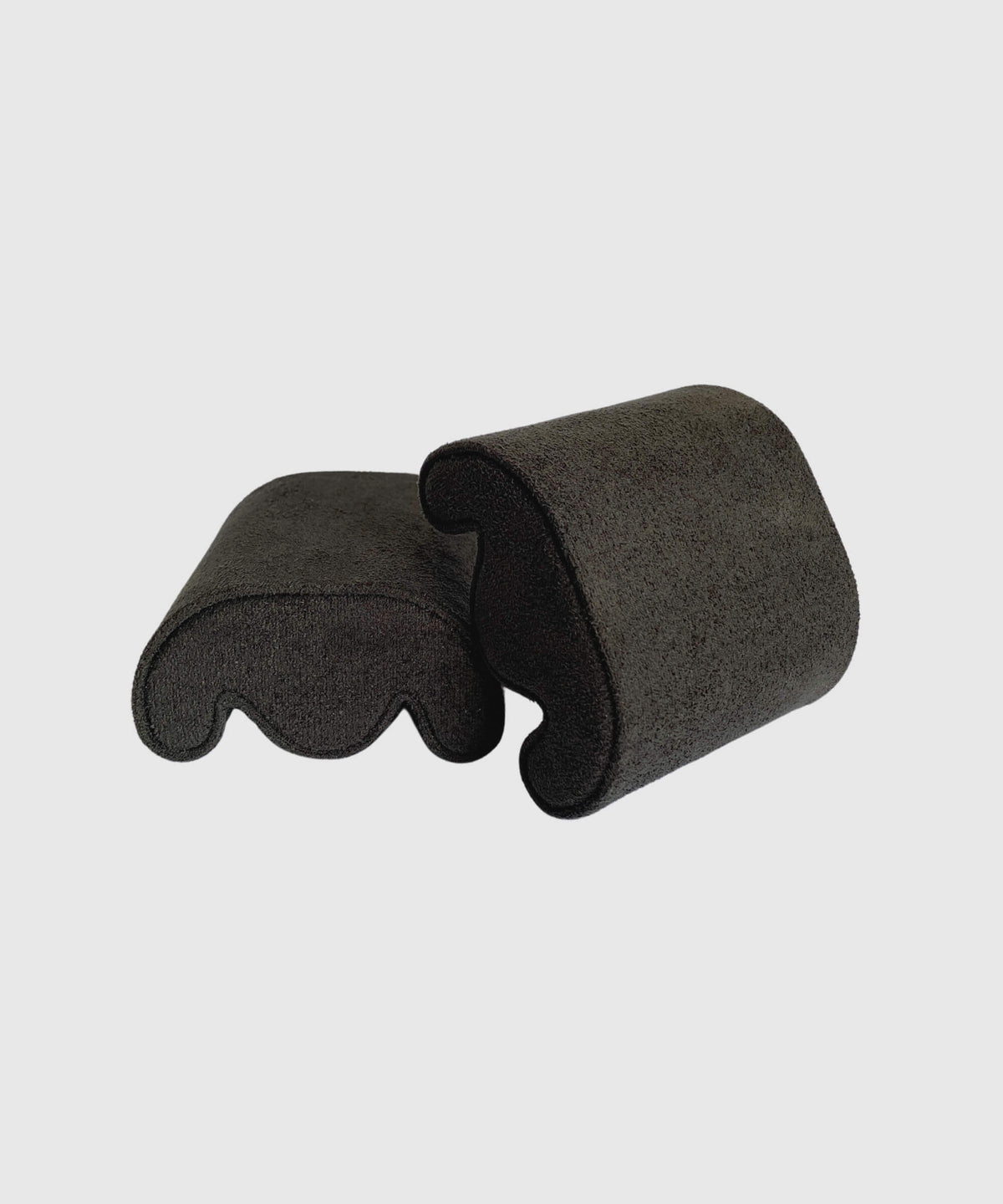 A pair of TAWBURY Fraser Replacement Watch Case Pillows - X-Small - Black/Charcoal, suitable for any wrist size, on a white background.