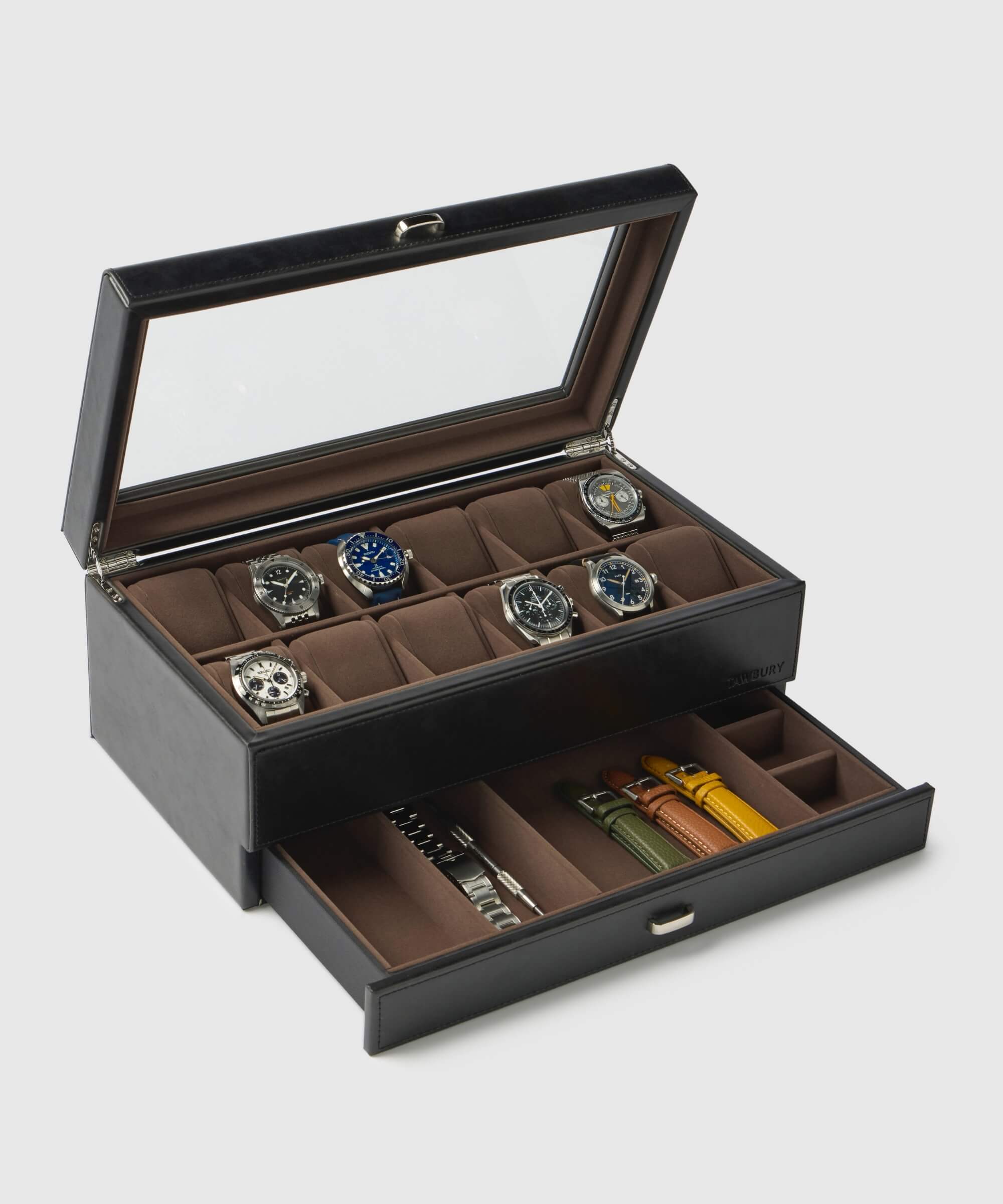 The TAWBURY Bayswater 12 Slot Watch Box in Black/Grey, made from vegan leather, features a transparent lid showcasing six watches on the top layer and includes collector essentials stored in a pull-out drawer beneath.