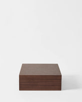 The TAWBURY Grove 12 Slot Wooden Watch Box, featuring a solid lid and dark walnut wood finish, sits on a plain white background—perfect for elegant watch storage.