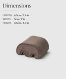 The TAWBURY Grove Watch Box Pillows - X-Small, in brown with a wave design, are perfect for displaying watch collections. Dimensions: 6.5cm x 5cm x 3.5cm (2.6in x 2in x 1.4in), ideal for enhancing Grove watch boxes and complementing sleek wrist displays.