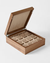 TAWBURY Grove 12 Slot Wooden Watch Box in light walnut with solid lid, featuring a beige interior, multiple compartments, and removable cushions for stylish watch or jewelry storage.