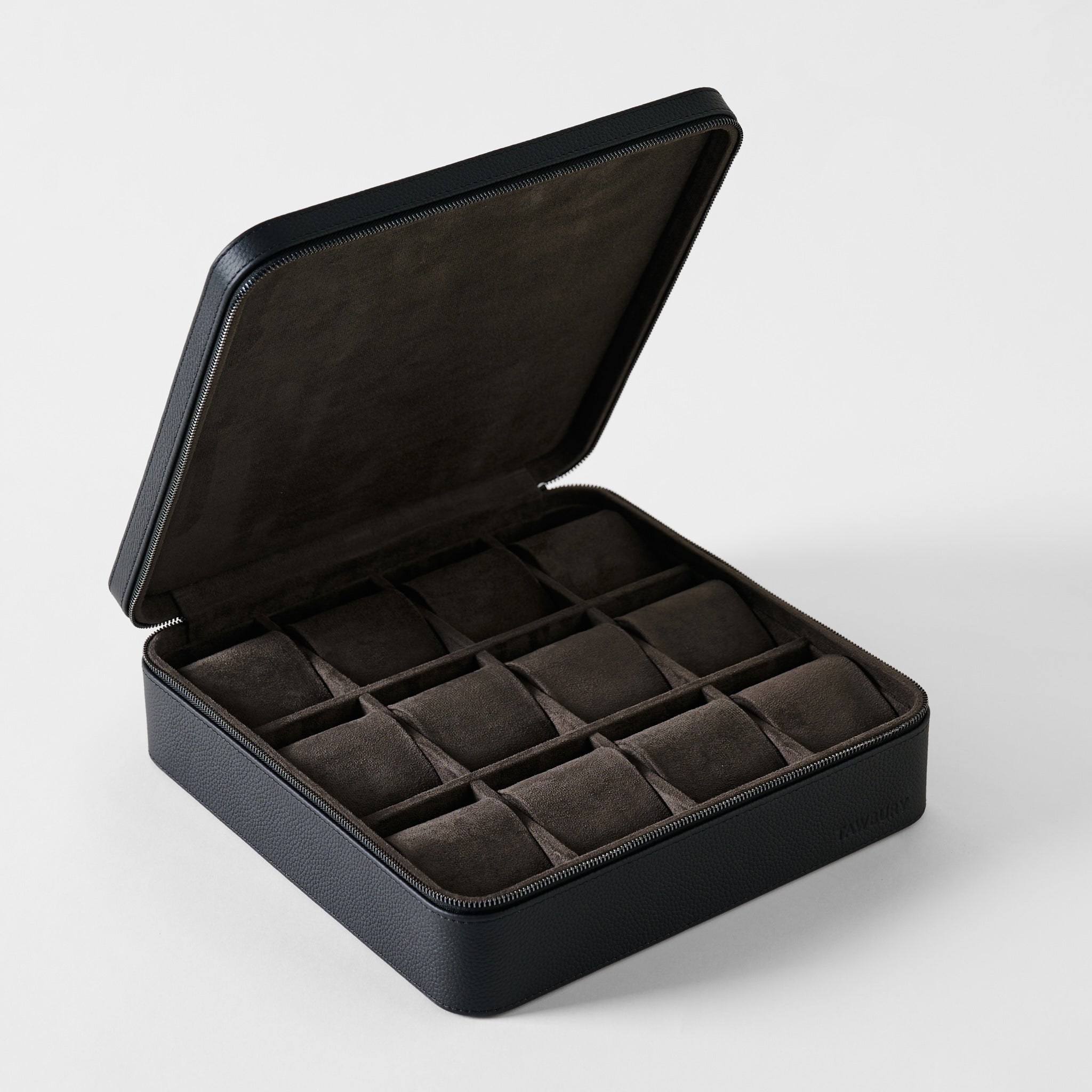 TAWBURY Fraser 12 Watch Case - Midnight Black: a black leather watch box with a hinged lid, featuring twelve interior compartments with brown velvet cushions for watch storage.