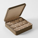 Open TAWBURY Fraser 12 Watch Case - Truffle Taupe with twelve cushioned compartments for watch storage.