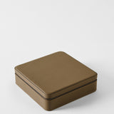 Square taupe leather Fraser 12 Watch Case - Truffle Taupe with a zippered closure.