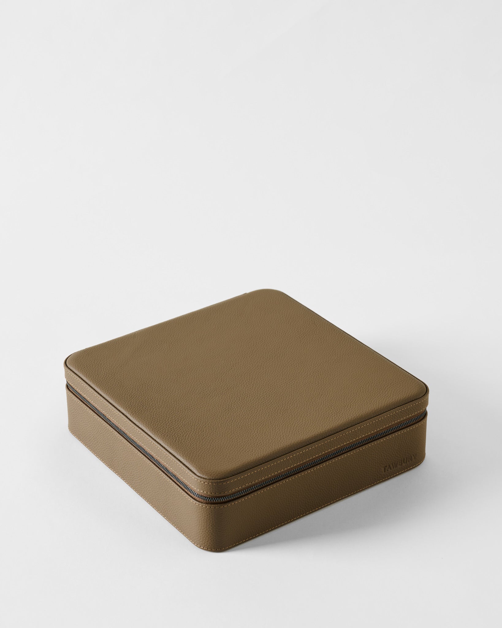 Square taupe leather Fraser 12 Watch Case - Truffle Taupe with a zippered closure.