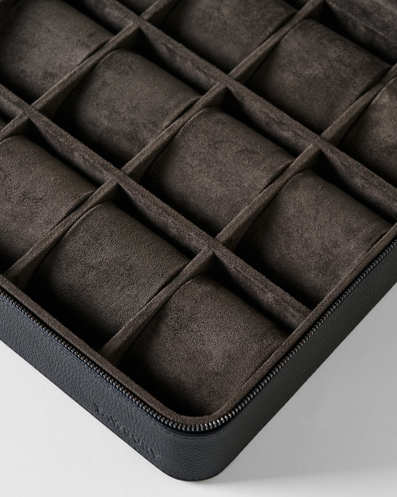 TAWBURY Fraser 12 Watch Case - Midnight Black with twelve empty compartments containing dark gray cushions.