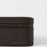 Close-up of a Fraser 3 Watch Case with Storage - Espresso Brown, a brown, leather-textured travel watch box with a zippered closure.