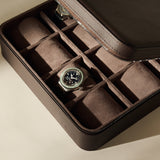 Espresso brown TAWBURY Fraser 12 Watch Case with twelve compartments, each featuring a soft cushion, containing two wristwatches.
