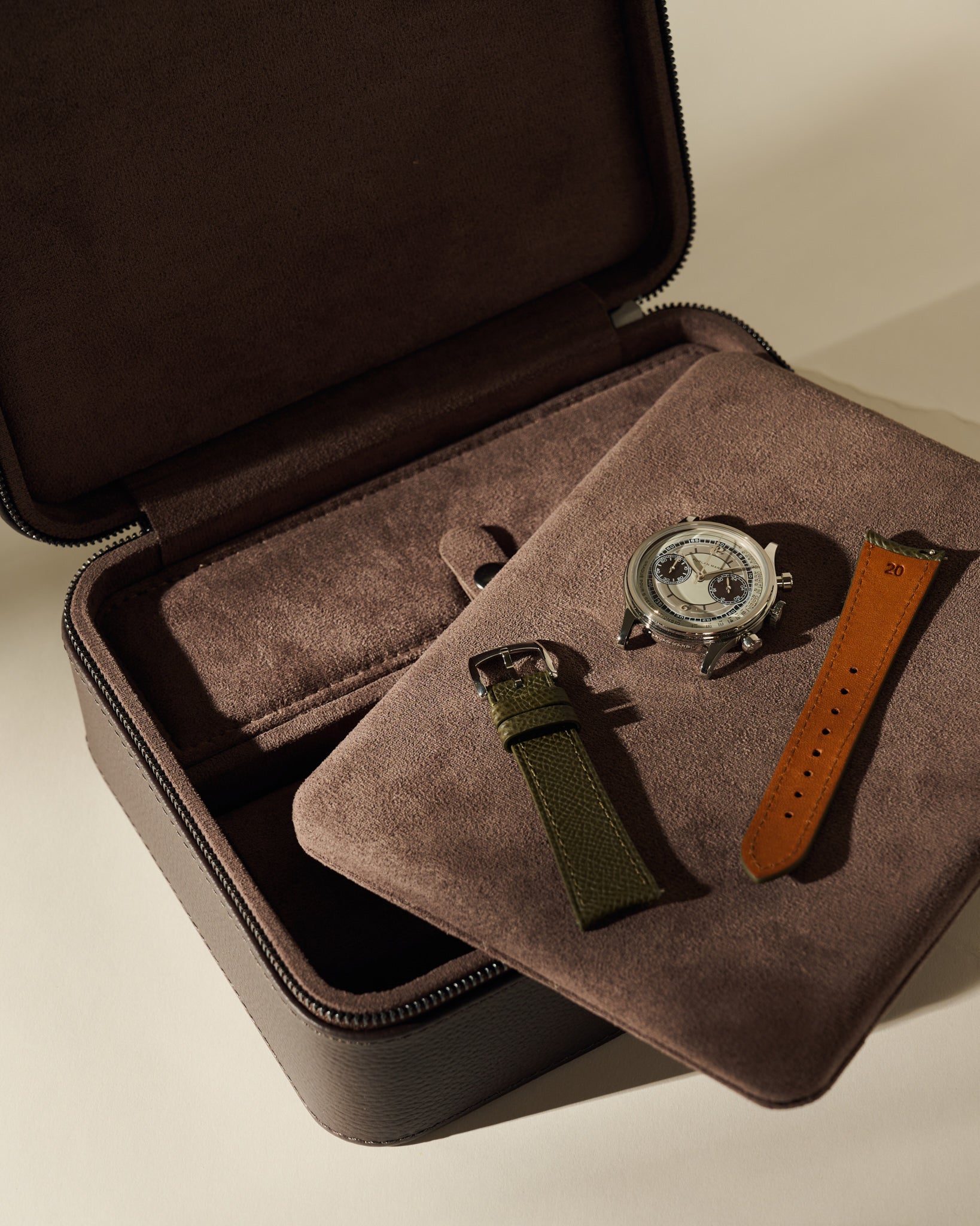Open TAWBURY Fraser 3 Watch Case with Storage - Espresso Brown containing a detachable tray, a wristwatch, a green watch strap, and a tan leather watch strap.