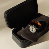 Open Fraser 3 Watch Case - Midnight Black containing a silver chronograph wristwatch with a black leather strap.