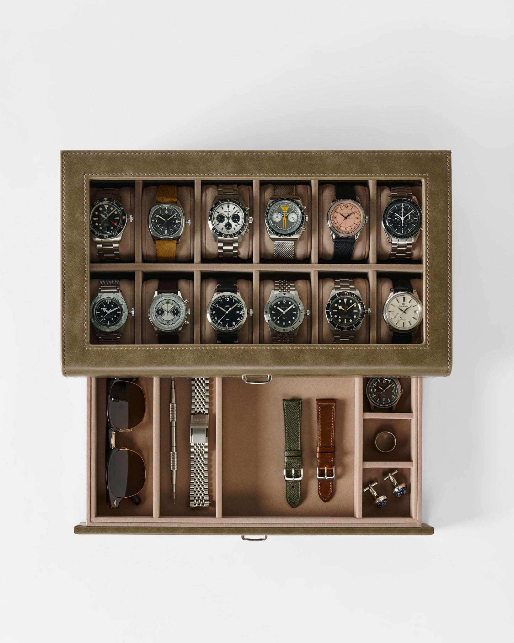 The TAWBURY Bayswater 12 Slot Watch Box with Storage in Taupe is the perfect organizer for twelve watches, sunglasses, extra straps, a metal bracelet, cufflinks, and a watch tool—all kept neat and tidy.