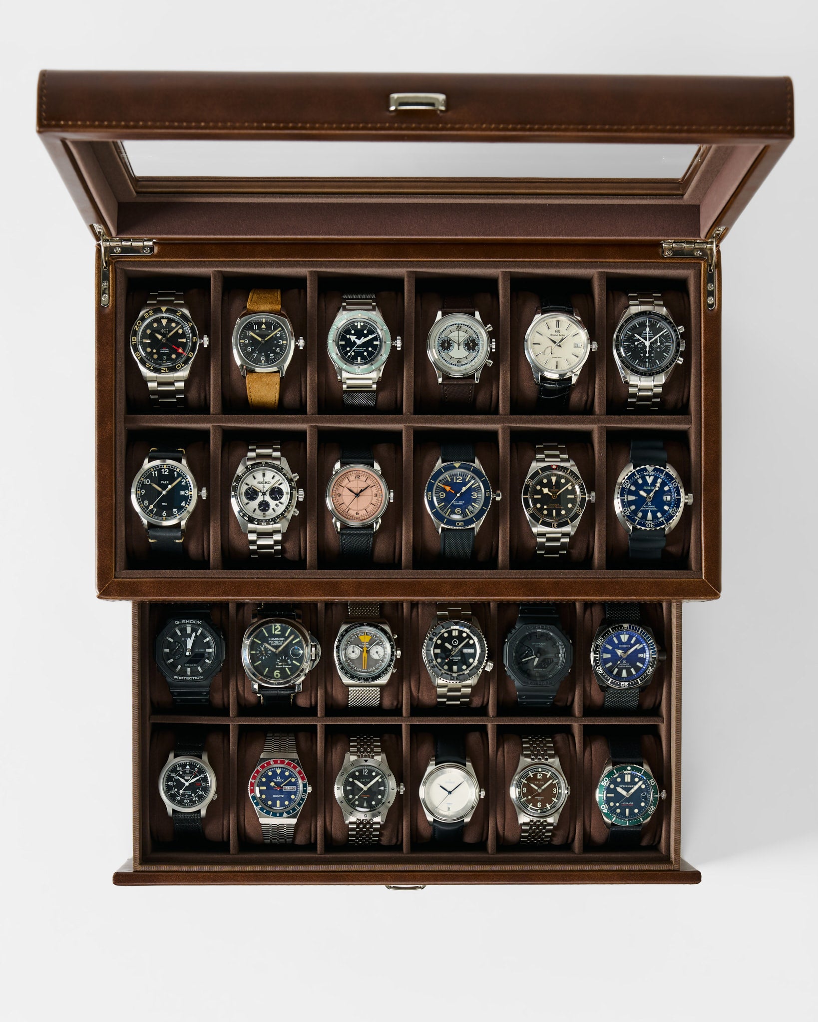 The TAWBURY Bayswater 24 Slot Watch Box with Drawer in brown features a glass lid and is ideal for storing up to 24 watches, elegantly displayed in rows on a white background.
