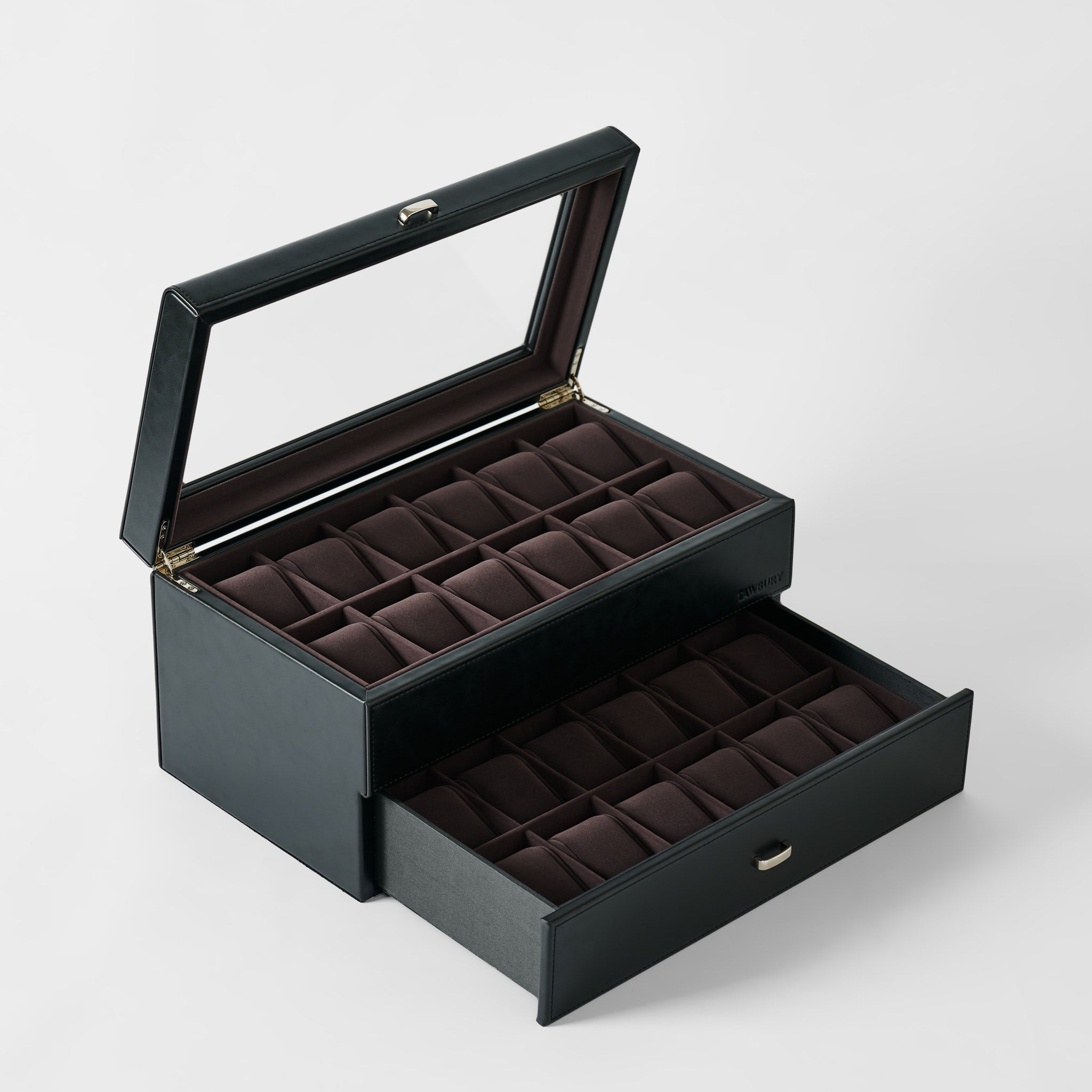 The TAWBURY Bayswater 24 Slot Watch Box with Drawer in Midnight Black features multiple compartments, a glass lid for display, and a lower pull-out drawer, all lined with dark brown fabric—ideal for organized watch storage.