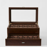 The TAWBURY Bayswater 24 Slot Watch Box with Drawer in Chestnut Brown features an open glass lid, pull-out drawer, and watch pillows for organized storage.