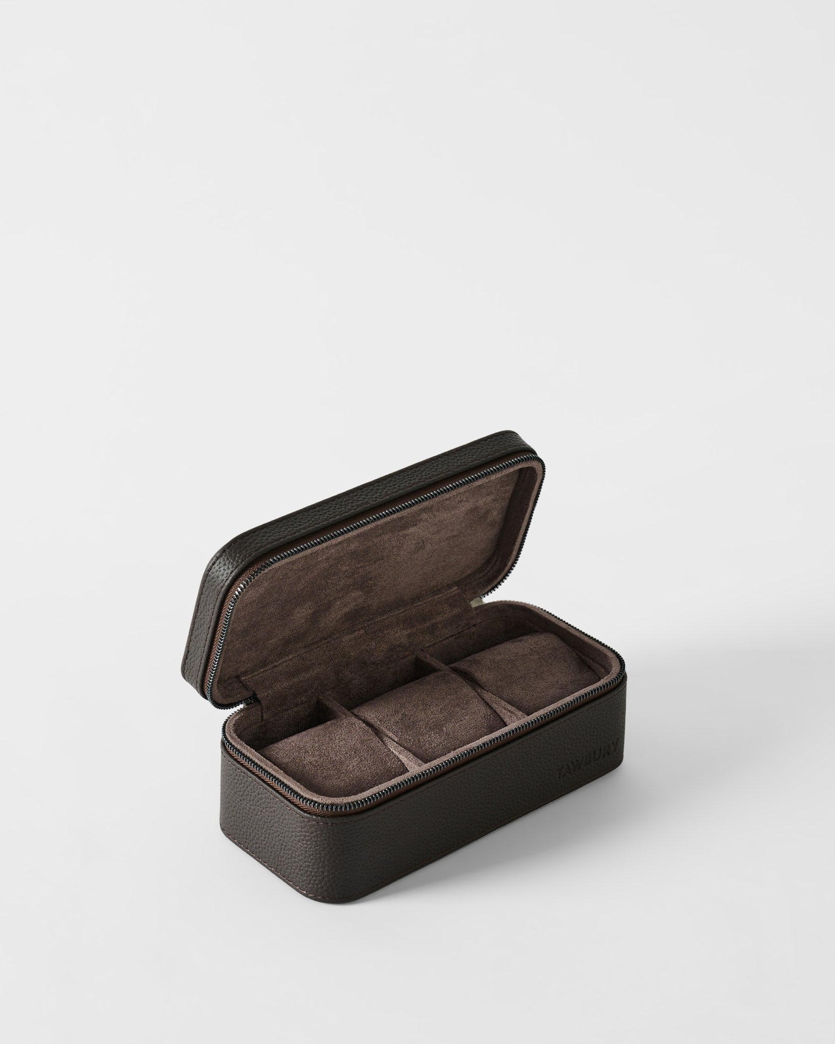 The TAWBURY Fraser 3 Watch Case in brown features a textured leather finish, an open lid displaying three cushioned compartments for travel watch storage, all set against a plain white background.