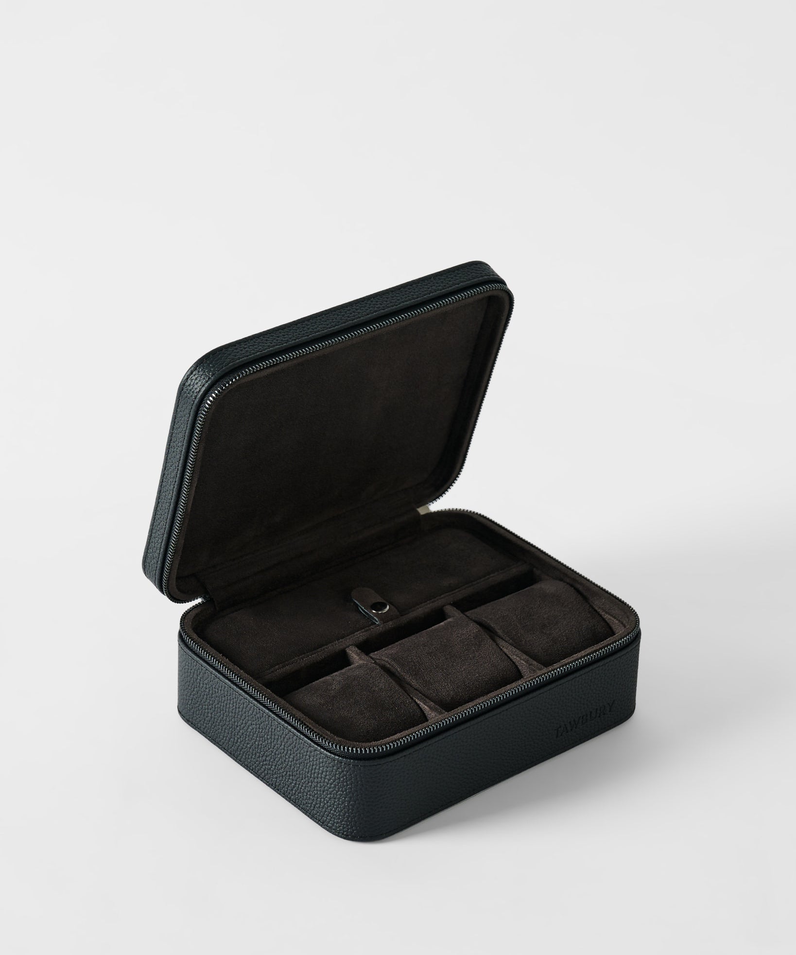 The TAWBURY Fraser 3 Watch Case with Storage - Black features a textured leather finish, an open lid, a soft dark interior, and three compartments for stylishly storing your watches.