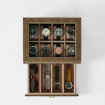 The TAWBURY Bayswater 8 Slot Watch Box with Storage in taupe keeps eight wristwatches, a pair of sunglasses, three watch straps, and a metal bracelet neatly organized in separate compartments.