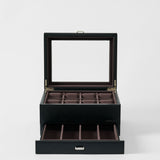 The TAWBURY Bayswater 8 Slot Watch Box with Storage in Midnight Black features a glass lid, eight watch compartments on top, and an open drawer with extra sections, displayed against a plain white background.
