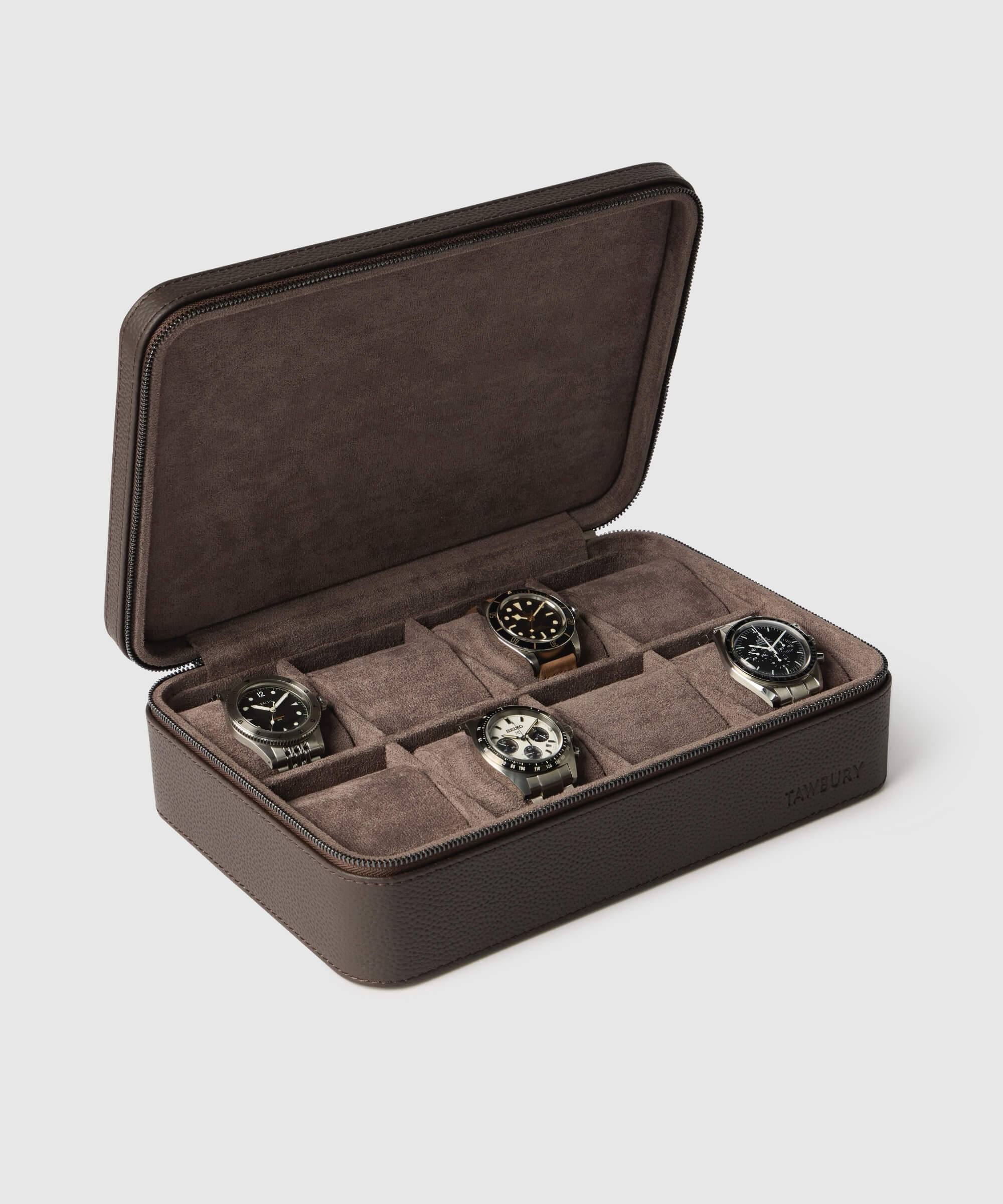 The TAWBURY Fraser 8 Watch Travel Case in brown leather offers six compartments to stylishly hold four wristwatches with unique designs, all set against a plain background.