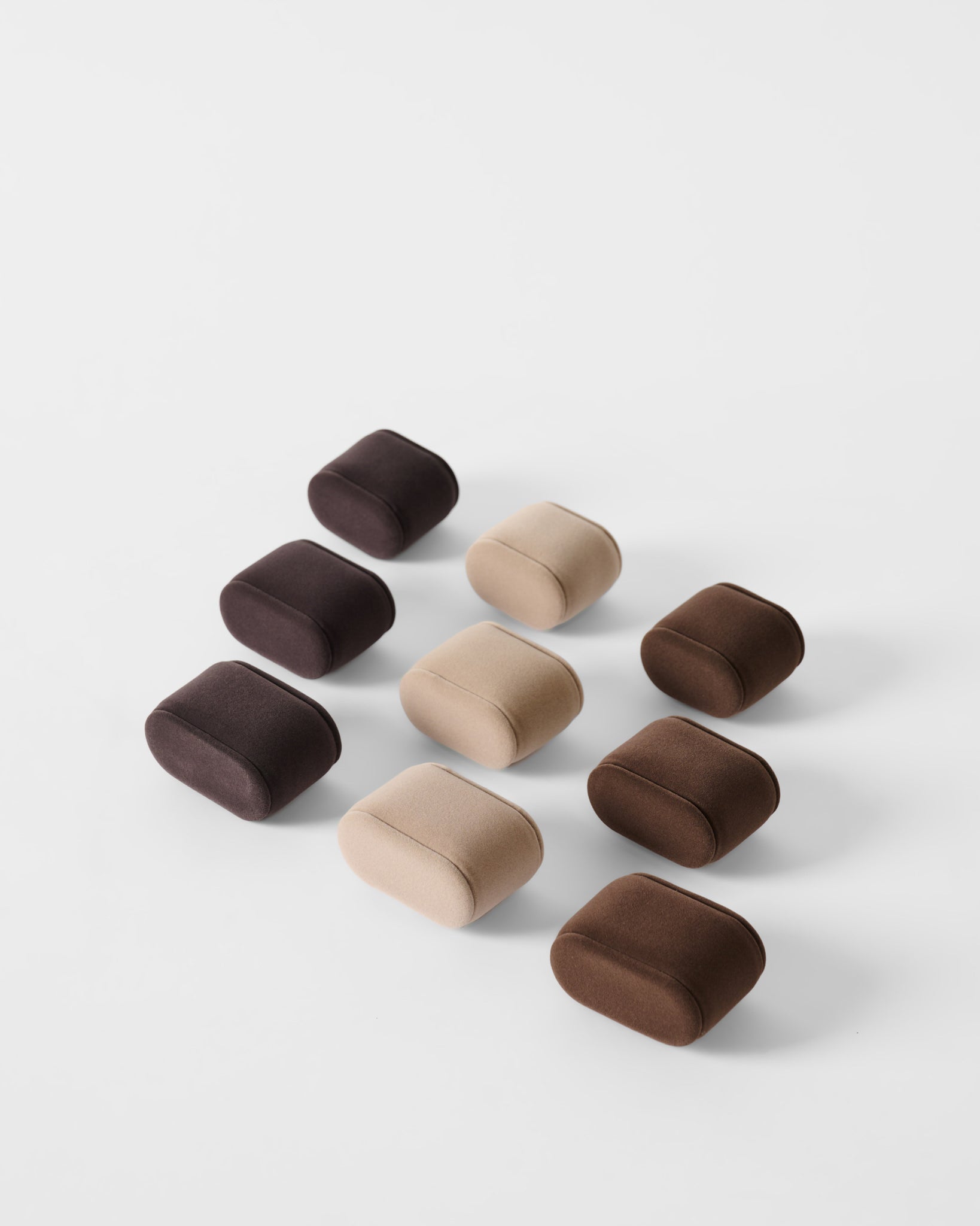 Eight Bayswater watch boxes with storage by TAWBURY, in brown faux leather, are arranged in a grid pattern on a white background.