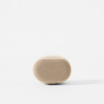 The TAWBURY Bayswater Watch Pillow in beige (X-Small, 55mm) has a soft, smooth texture like velveteen and features an oval shape, shown here on a plain white background.