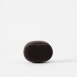 A TAWBURY Bayswater Watch Pillow in charcoal, 55mm X-Small, oval-shaped and soft like velveteen, rests on a white background.