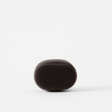 A TAWBURY Bayswater Watch Pillow in charcoal, 55mm X-Small, oval-shaped and soft like velveteen, rests on a white background.