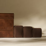 The TAWBURY Bayswater 8 Slot Watch Box with Storage in Chestnut Brown displays multiple cushioned watch holders in a stylish faux leather design, ideal for organizing and protecting your timepieces.