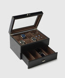 TAWBURY's Bayswater 6 Watch Jewellery Box in Black/Grey, made from premium vegan leather, features an open lid like a glass exhibition window to showcase sleek watches and cufflinks. It also includes a handy drawer below to elegantly store sunglasses.