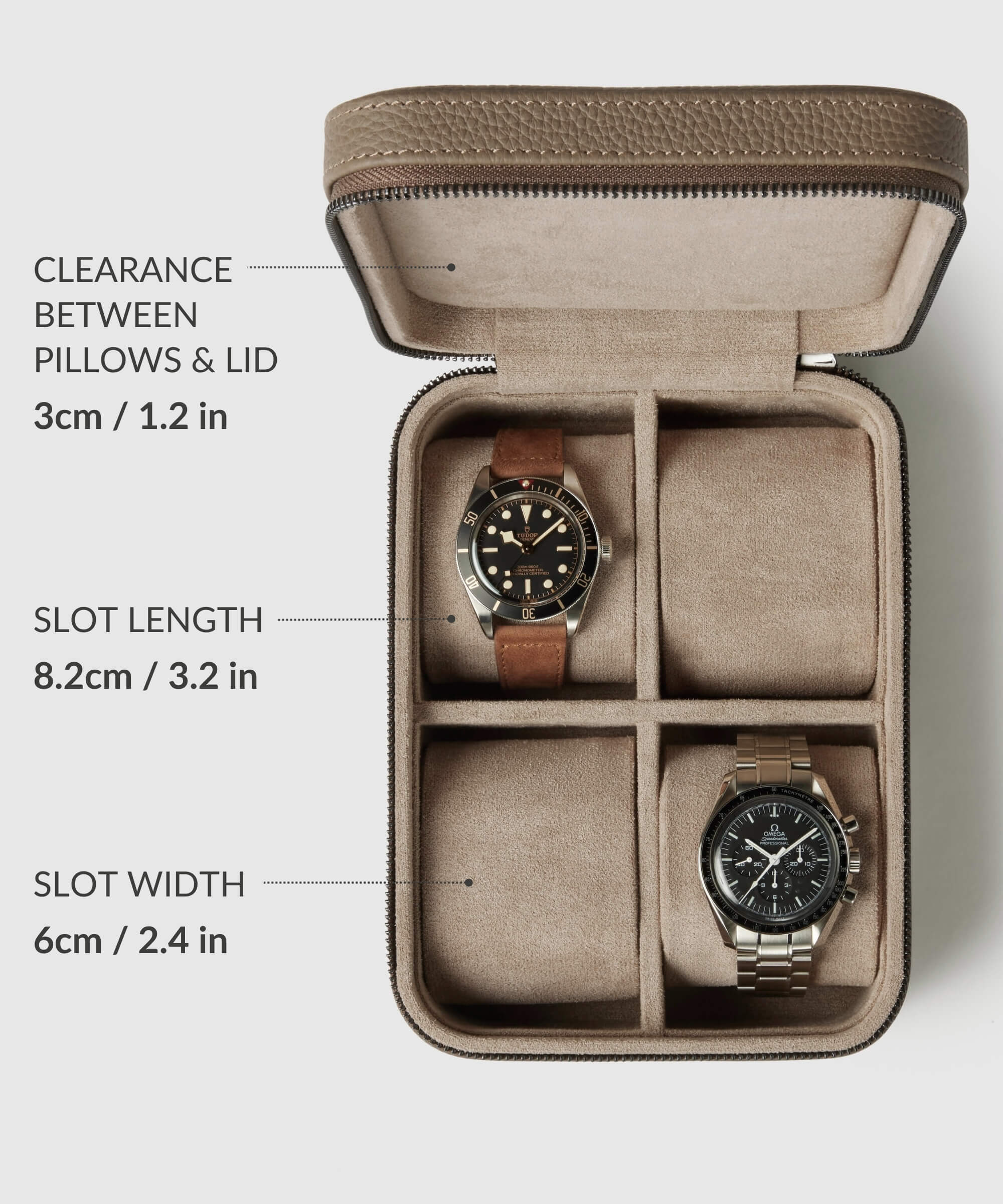 A TAWBURY Fraser 4 Watch Travel Case - Taupe (Coming Soon) with two watches inside, highlighting clearance between pillows and lid as 3 cm/1.2 in, slot length as 8.2 cm/3.2 in, and slot width as 6 cm/2.4 in—perfect for stylish watch storage.