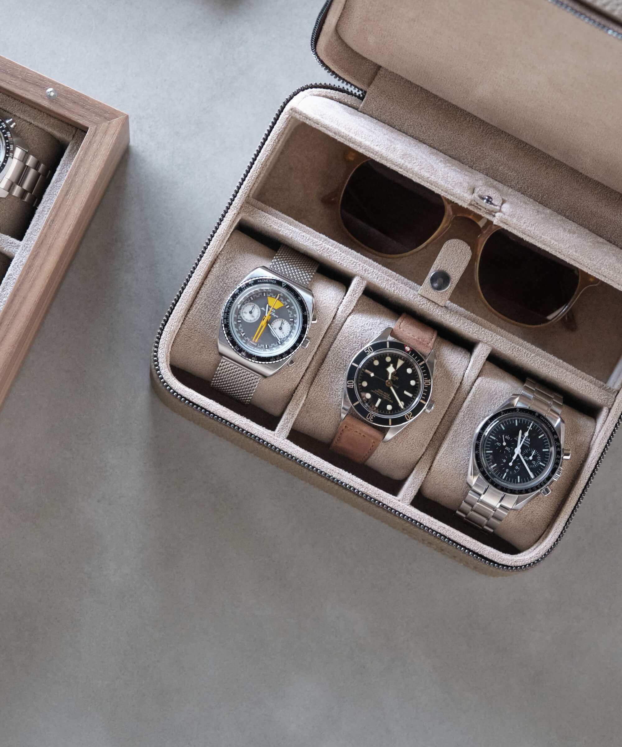 A TAWBURY Fraser 3 Watch Travel Case with Storage - Taupe providing protection for multiple watches.