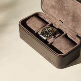 The TAWBURY Fraser 3 Watch Case in brown features multiple compartments for organizing your watches, making it an ideal travel storage solution.