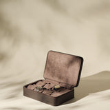 The TAWBURY Fraser 8 Watch Case in brown is open on a neutral background, beautifully displaying its elegant suede leather design and premium watch storage.