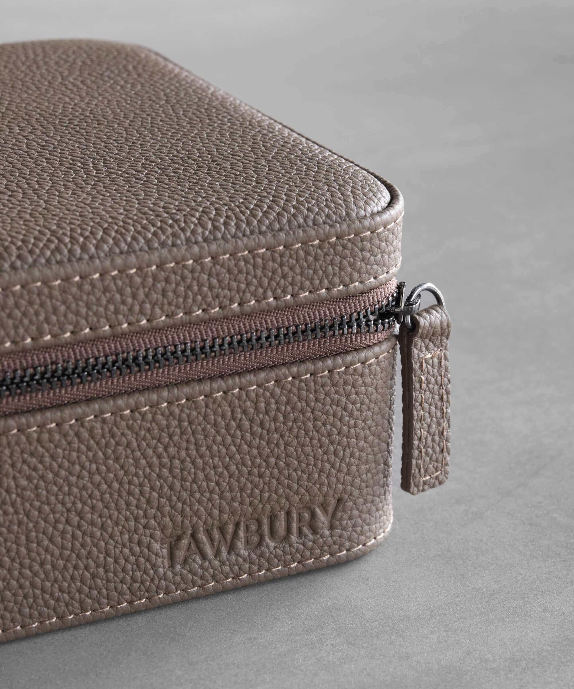 A Fraser 3 Watch Travel Case with Storage - Taupe by TAWBURY, providing protection for the watch lover.