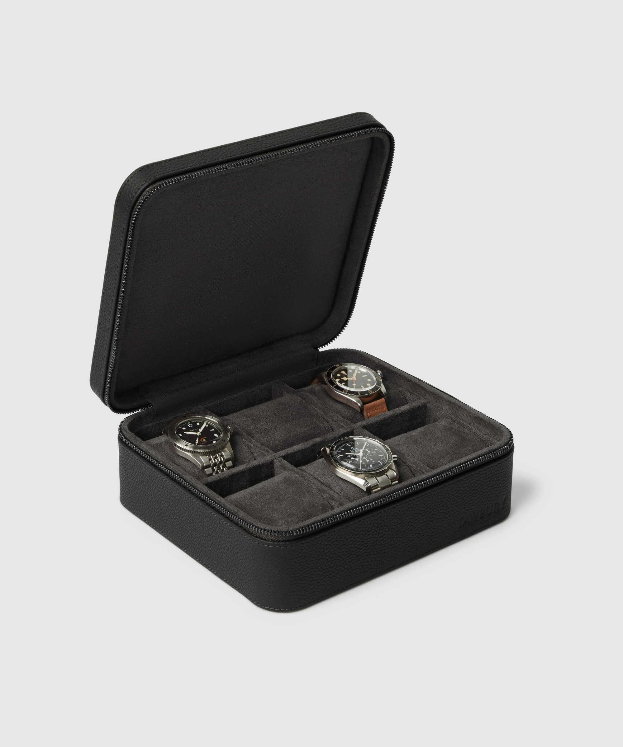 The Fraser 6 Watch Travel Case - Black (Coming Soon), a luxury leather watch case from the TAWBURY range, features a black exterior and padded interior with individual compartments for three watches, displayed against a plain background.