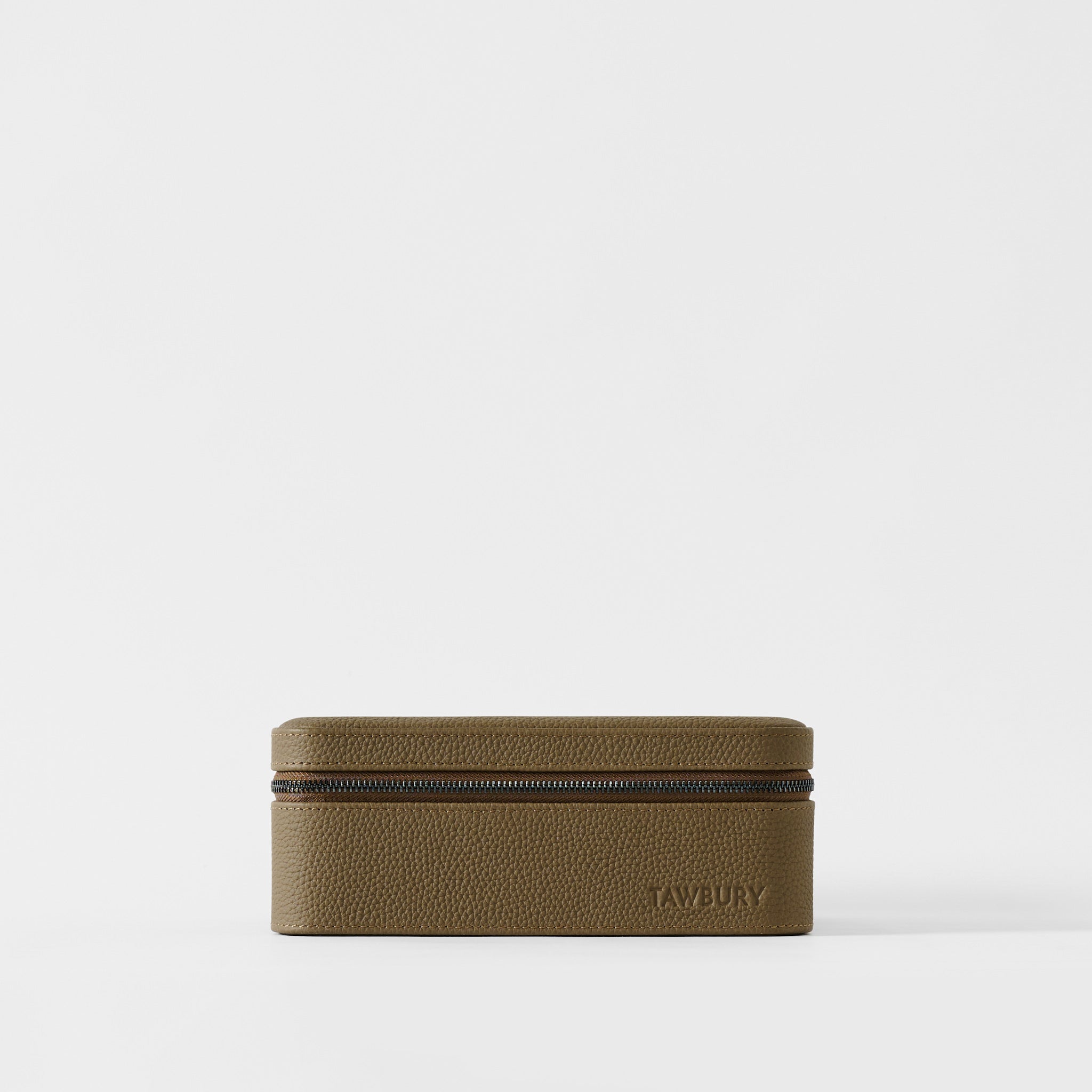 A rectangular, textured truffle taupe leather Fraser 3 Watch Case with Storage by TAWBURY features the brand name embossed on the lower front, displayed against a plain white background.