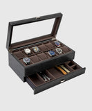 A TAWBURY Bayswater 12 Slot Watch Box with Drawer - Black containing a collection of timepieces.
