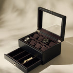 The TAWBURY Bayswater 8 Slot Watch Box in Black/Charcoal features a glass lid to display watches and an open drawer below for extra storage and compartments.