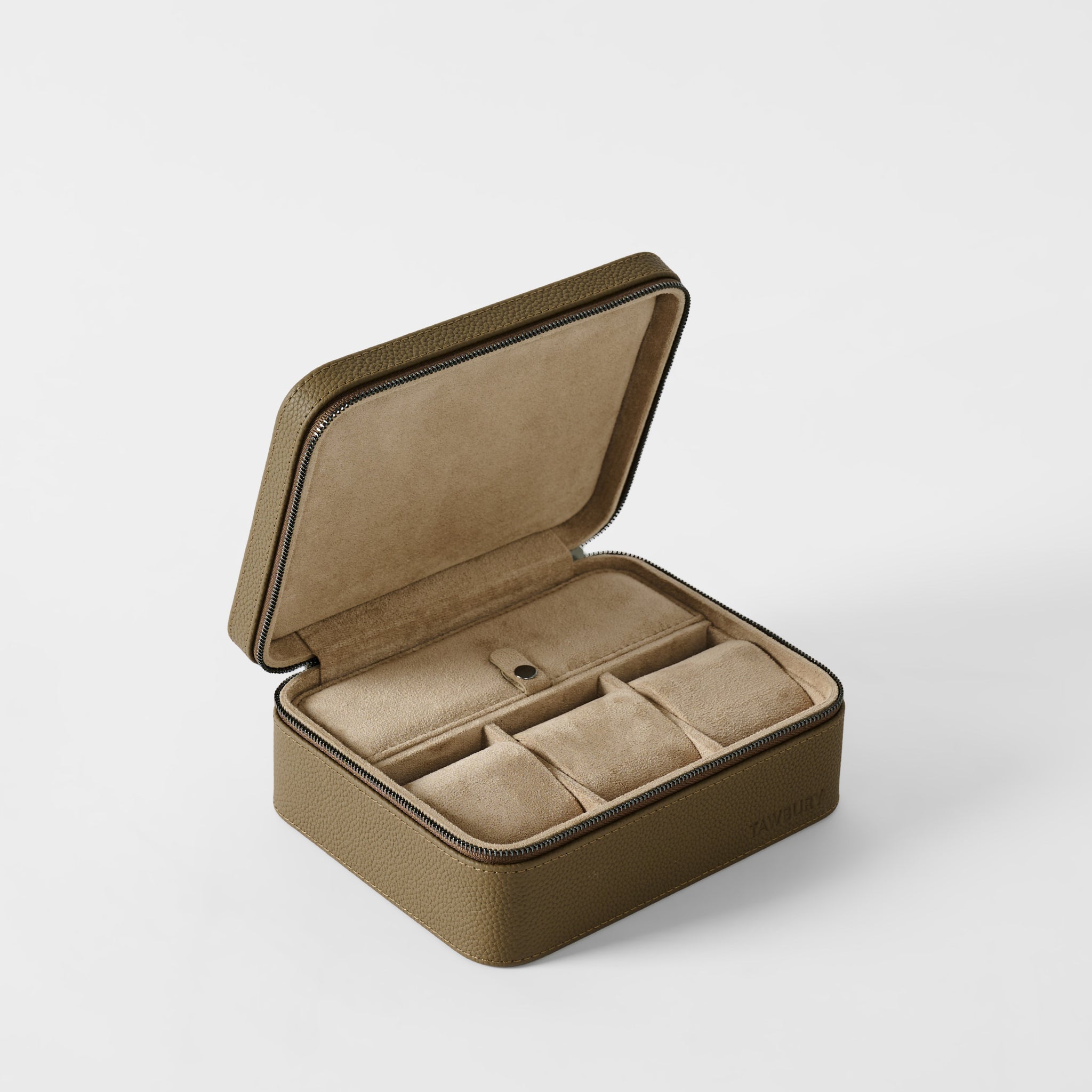 The TAWBURY Fraser 3 Watch Case with Storage in Truffle Taupe is open, showing a soft beige interior with compartments designed to neatly organize your watches and accessories.