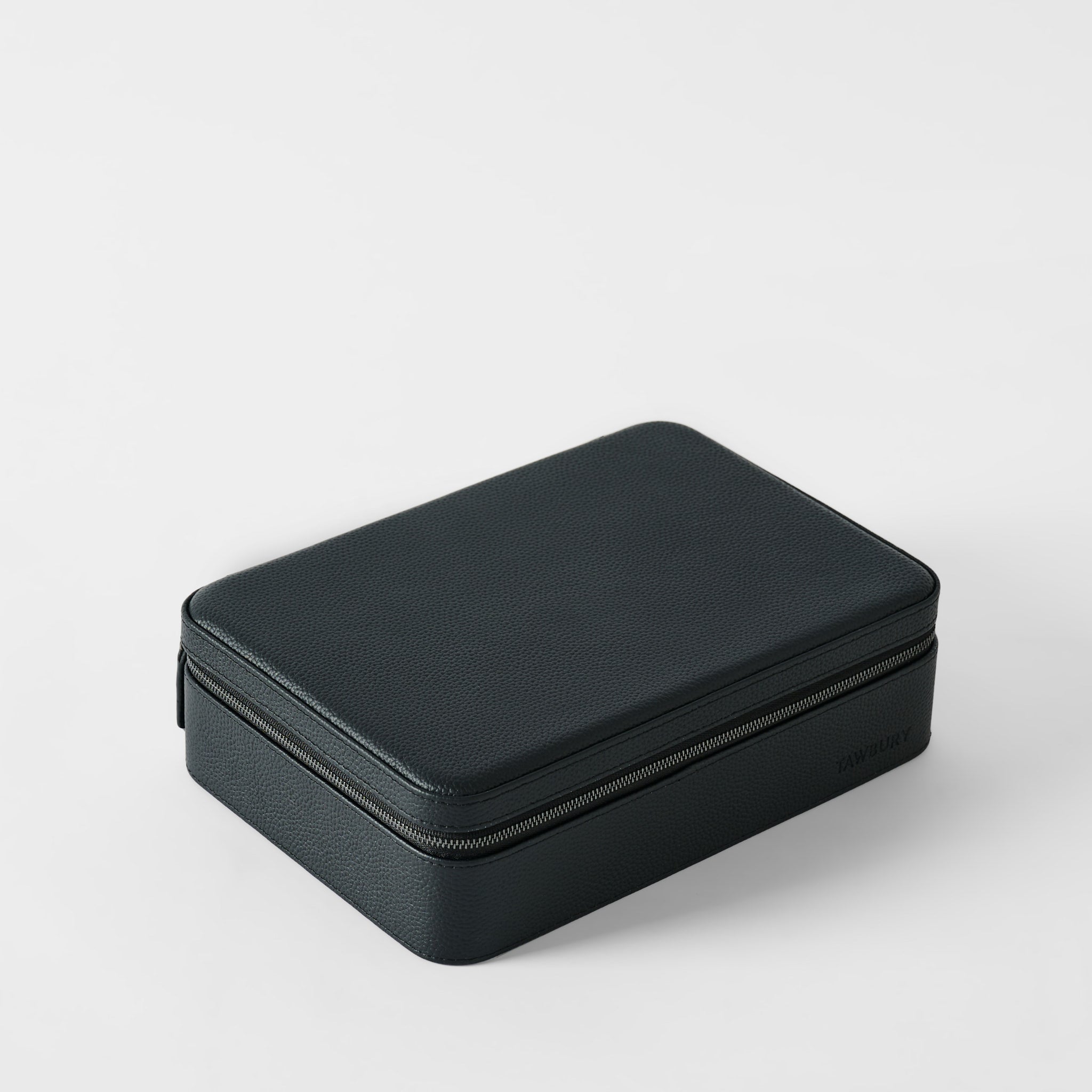 The TAWBURY Fraser 8 Watch Case in Midnight Black is shown closed, featuring a rectangular shape, textured leather surface, and zipper against a plain white background.