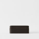 The TAWBURY Fraser 6 Watch Case in Espresso Brown features textured dark leather and a zipper, offering compact storage for six watches. Shown against a plain white background.