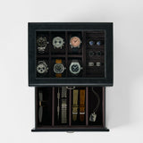 The TAWBURY Bayswater 6 Watch Jewelry Box in Black/Charcoal stores six watches, four pairs of cufflinks, two rings, sunglasses, three straps, a bracelet, and a dog tag—perfect for organized and elegant storage.