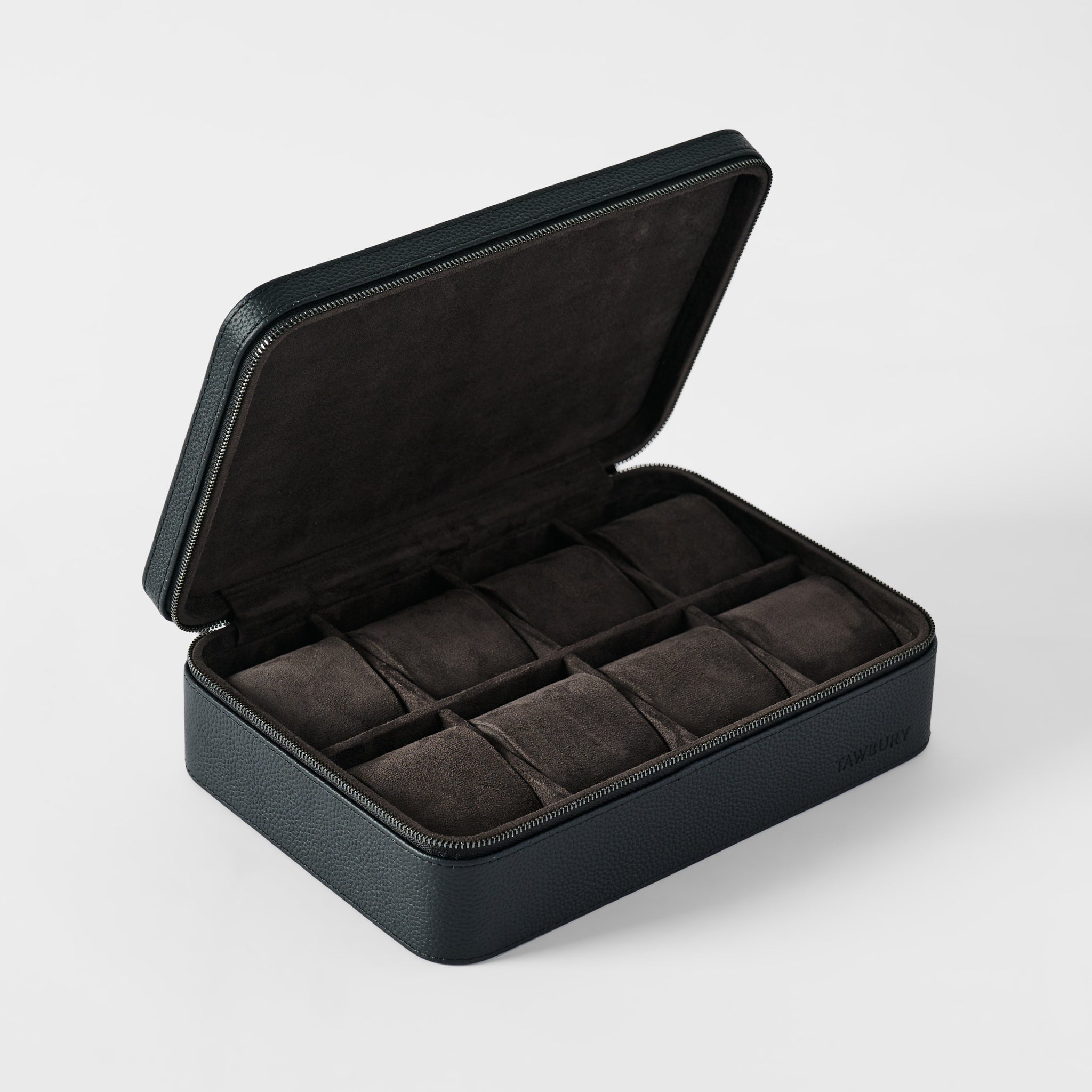 The TAWBURY Fraser 8 Watch Case in Midnight Black features a textured exterior, zippered closure, and open lid that reveals eight padded compartments lined with dark fabric for secure watch storage.