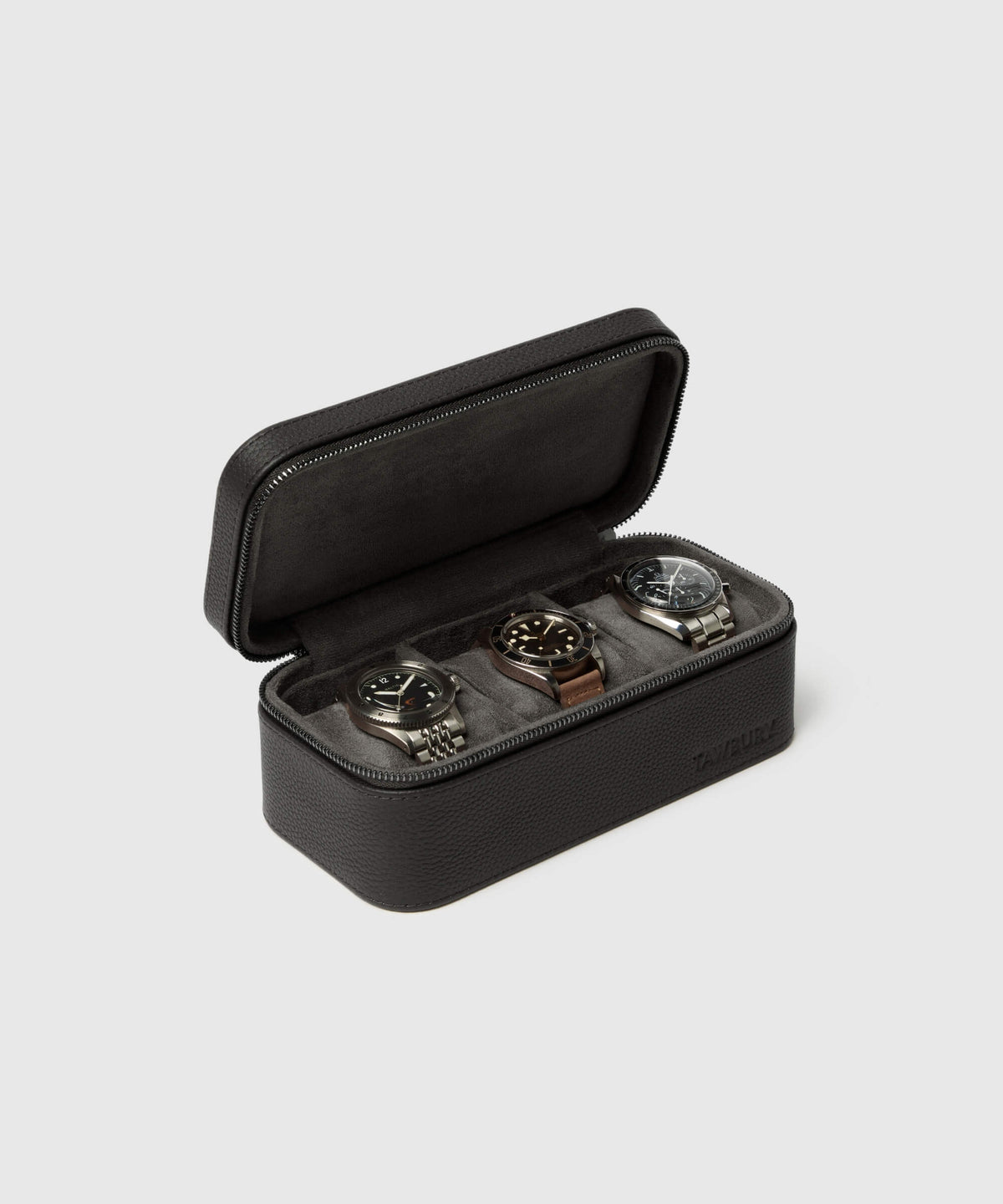 A Fraser 3 Watch Travel Case - Black designed with functionality and protection in mind. It features a TAWBURY leather exterior for a luxurious look and feel, and a soft interior lining to prevent scratches and damage to your watches.