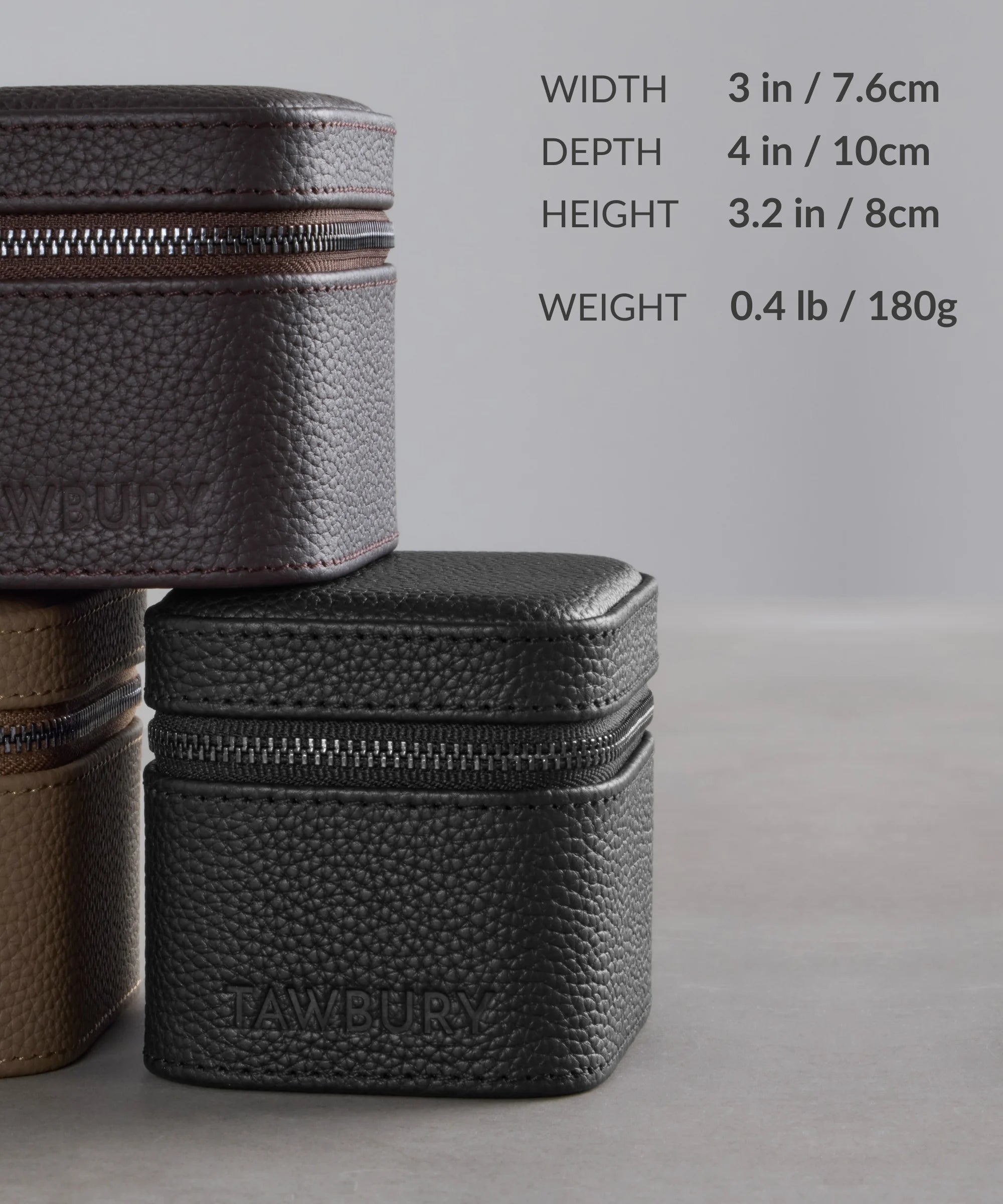 TAWBURY's Fraser 1 Watch Travel Case - Black (Coming Soon) offers premium watch protection in a textured zippered case. Dimensions: 3" W x 4" D x 3.2" H, weight: 0.4 lb (180g). Perfect leather travel case for your watch.