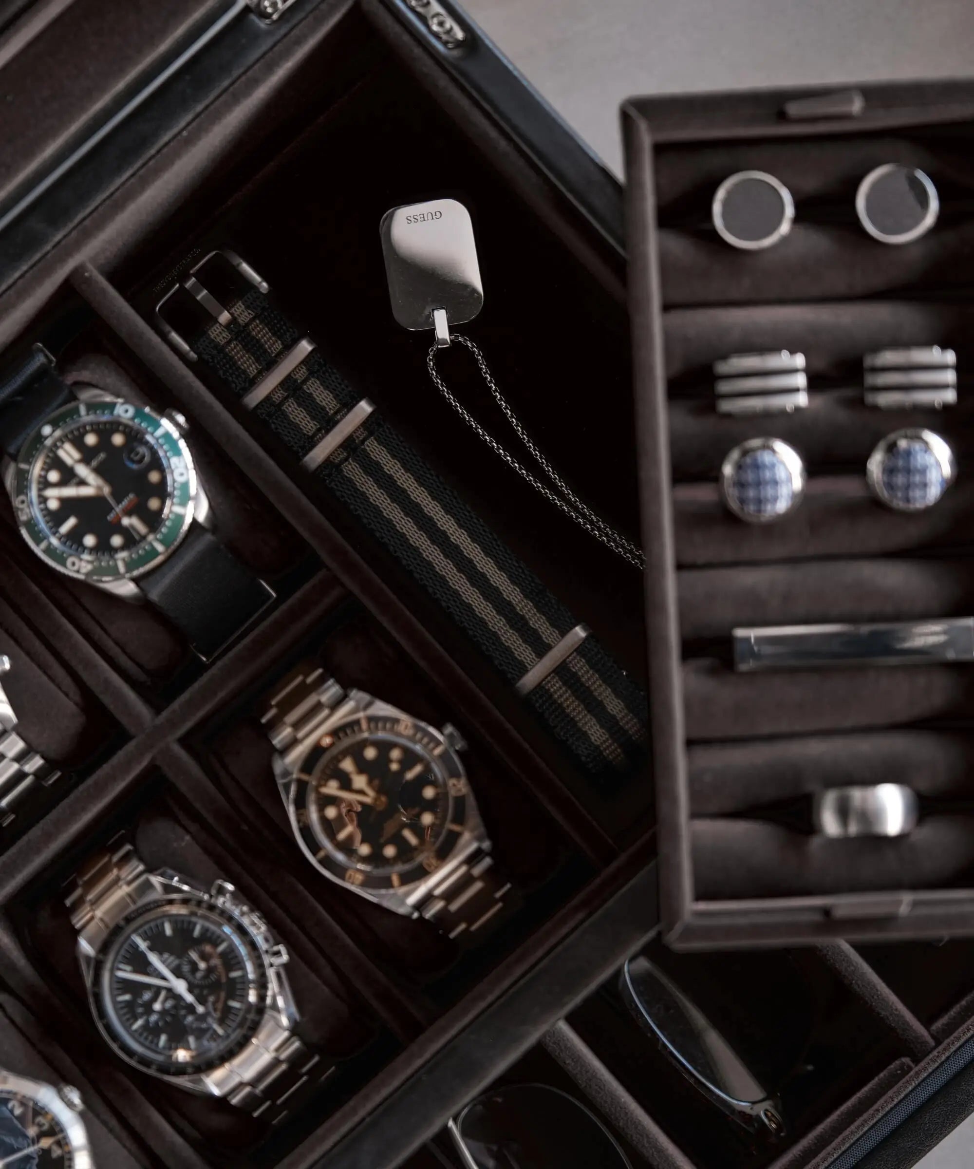 The TAWBURY Bayswater 6 Watch Jewellery Box in Black/Charcoal neatly organizes your wristwatches, cufflinks, and accessories, blending elegant design with efficient storage.
